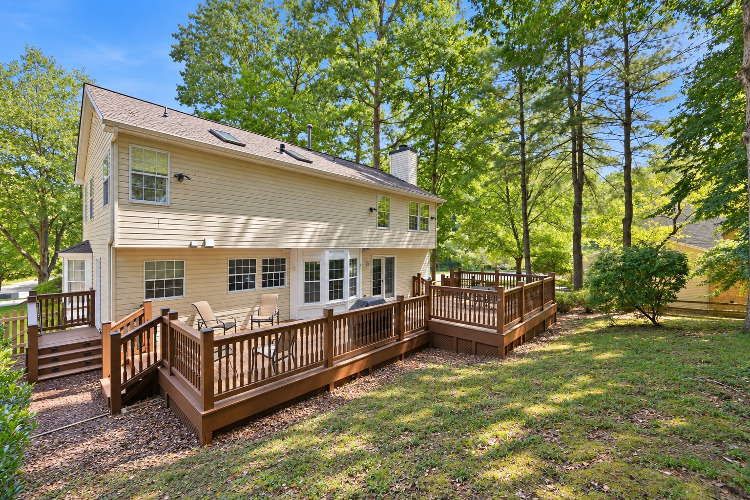 6228 Martin Road - Rear exterior with multi-level deck